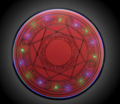 10W Mini Magic Array Wireless Charger in one of six colours: brown, cherry pink, red, black, yellow, or blue.