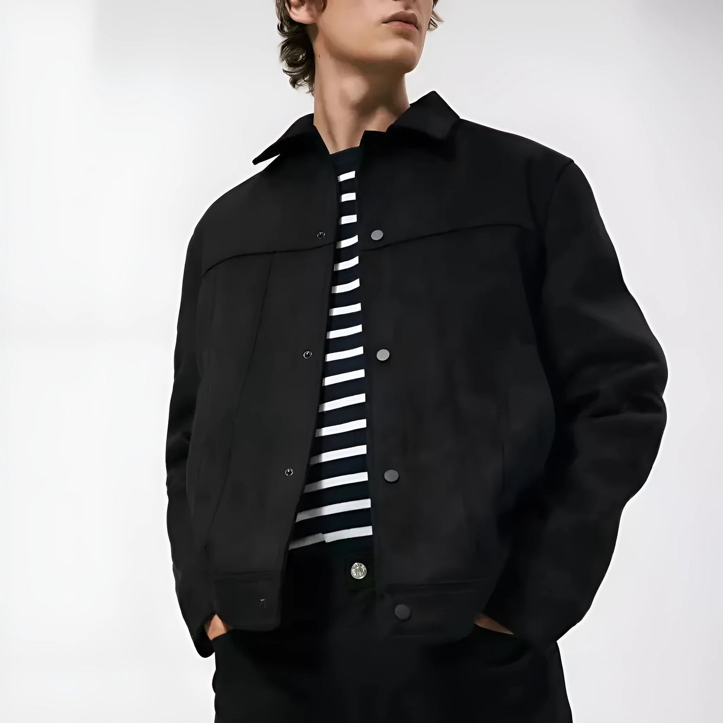 Black men's hooded jacket with a suede collar, loose long sleeves, and side seam pockets.