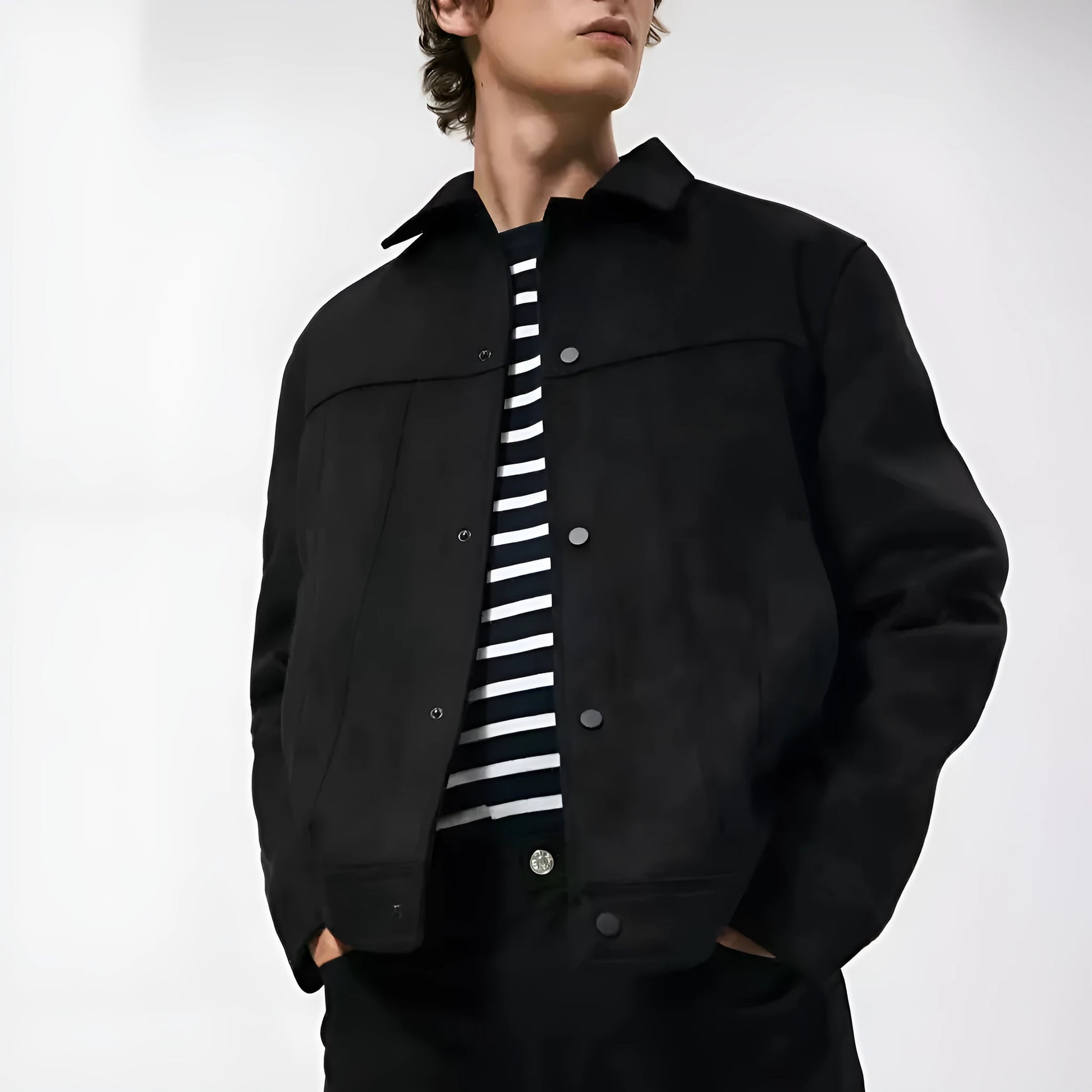 Black men's hooded jacket with a suede collar, loose long sleeves, and side seam pockets.