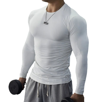 Men's black fitness tights with long sleeves and slim fit design for gym workouts and running