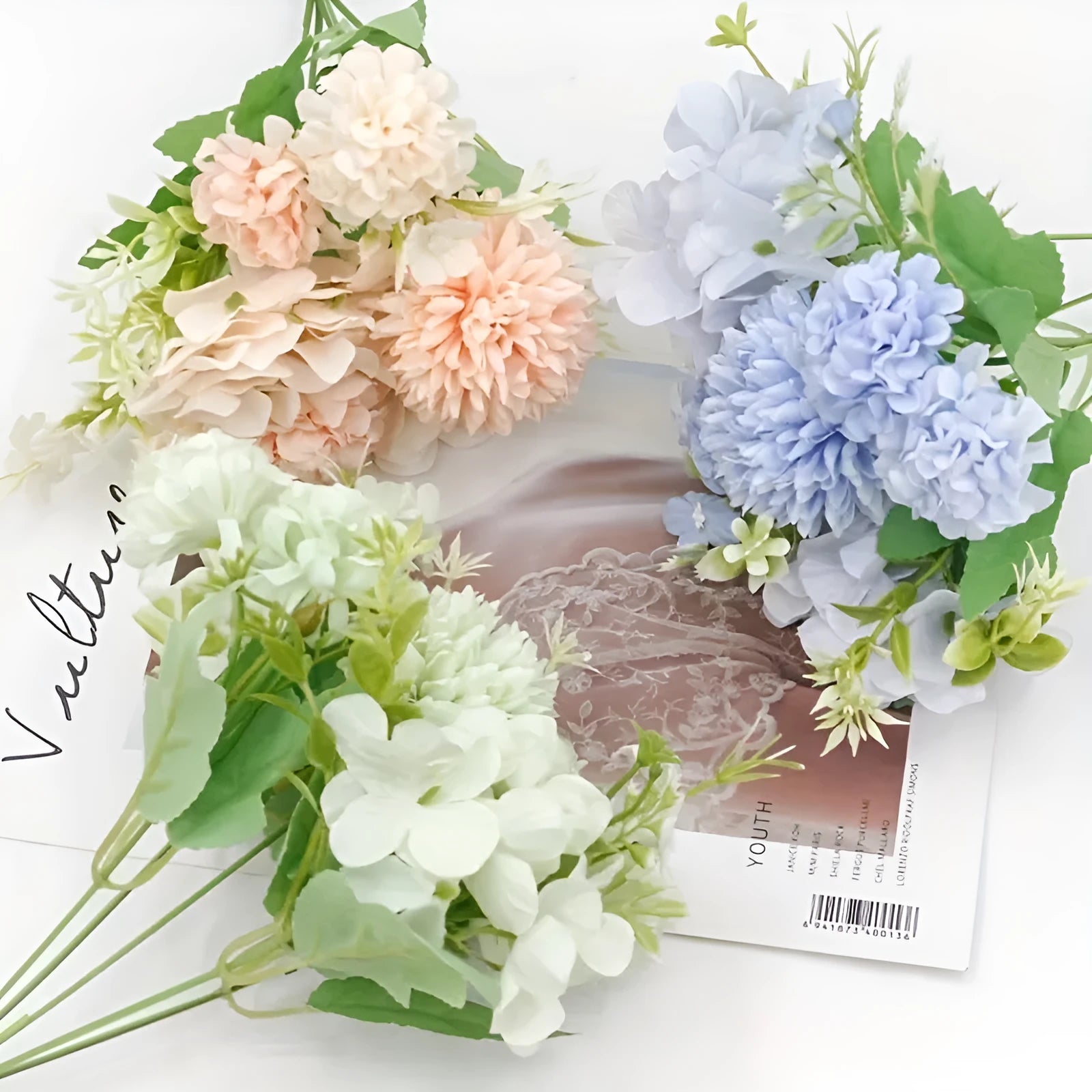 Combination artificial hydrangea flower arrangement in silk and plastic, shown in one of five available colours.