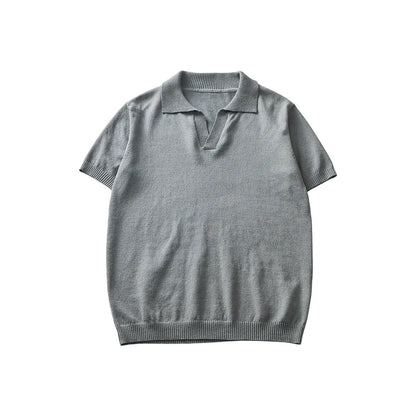 Knitted short-sleeved polo collar casual T-shirt in a solid colour on a hanger.