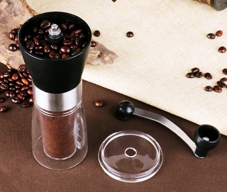 Hand coffee grinder and pepper mill with adjustable ceramic burr mechanism, compact 6cm diameter by 17cm height design weighing 310 grams, suitable for home coffee grinding and spice milling with 36 gram bean capacity.