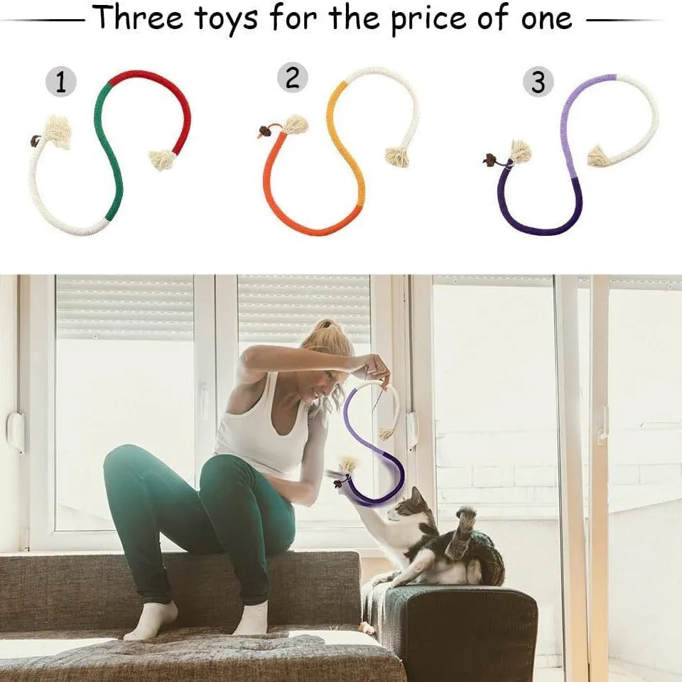 A 70cm long cotton string cat bite rope toy in three colour options: purple, orange, and red with green.