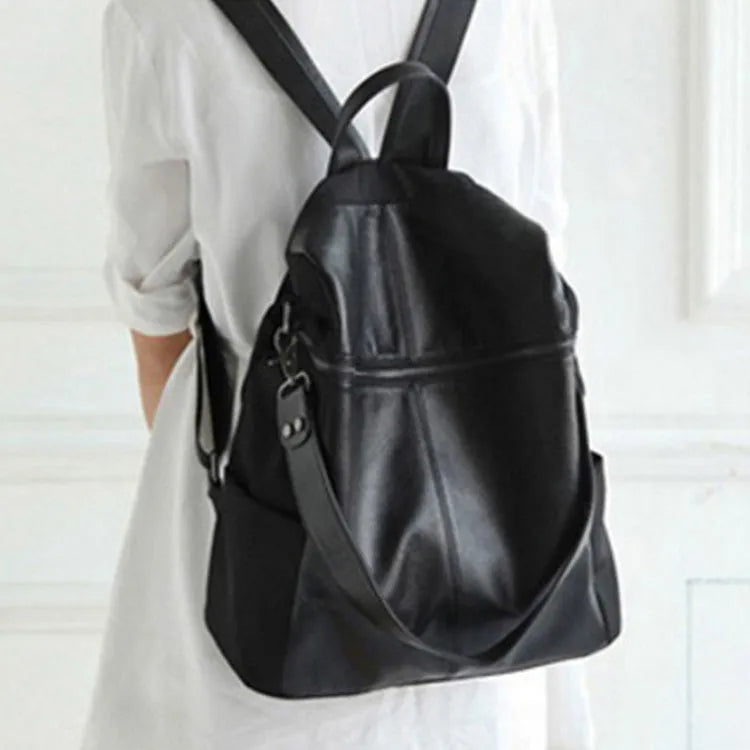 Genuine leather women's retro backpack in large capacity with waterproof construction and internal compartments