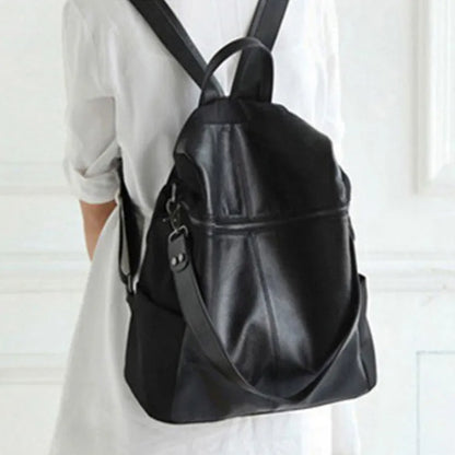 Genuine leather women's retro backpack in large capacity with waterproof construction and internal compartments