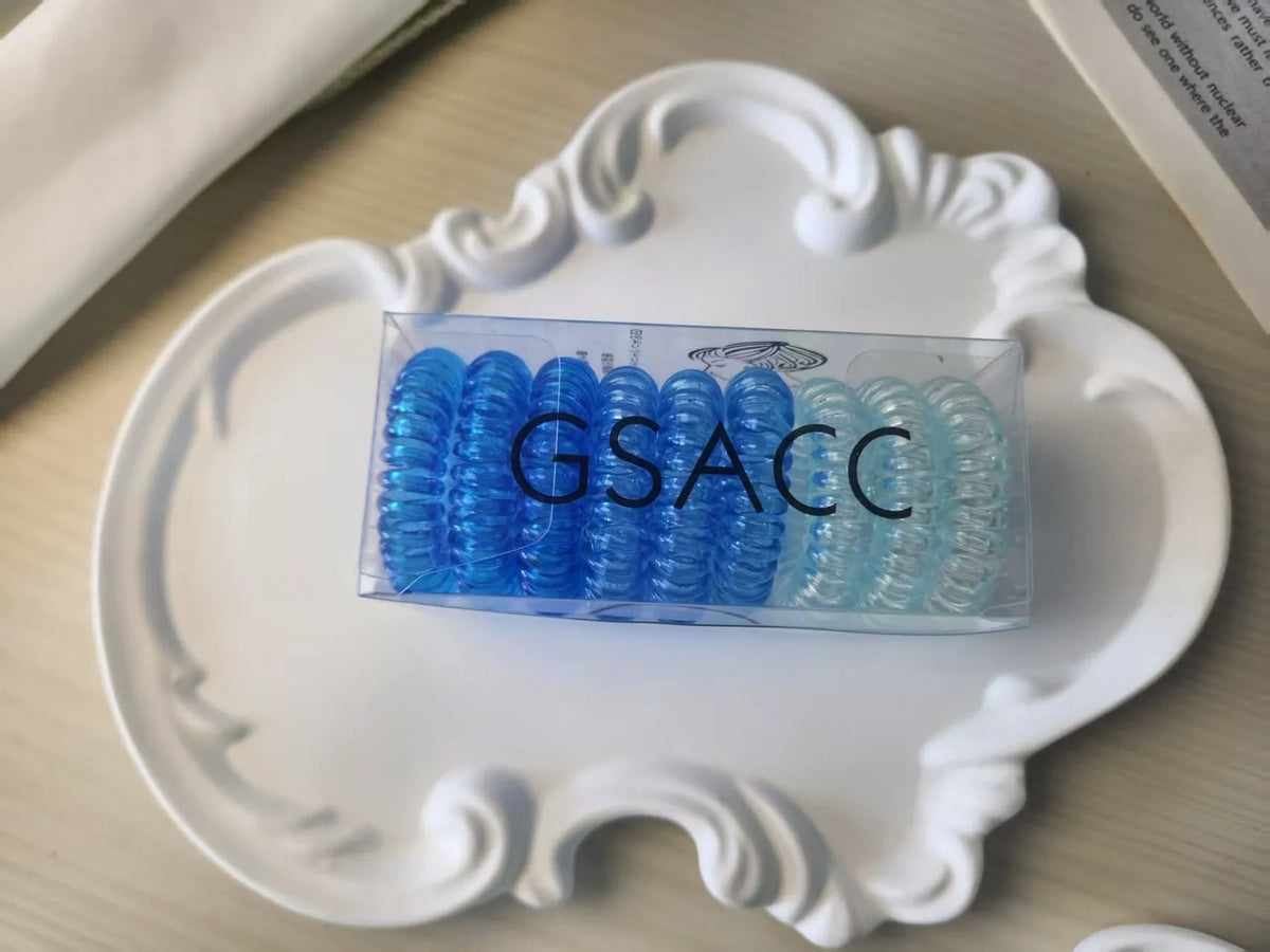 Set of 9 TPU traceless hairbands in various colours for phone cable organisation