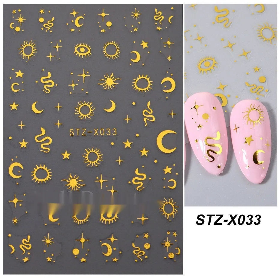 Assortment of black and silver nail sticker designs including cartoon and French tip patterns on a plastic sheet.