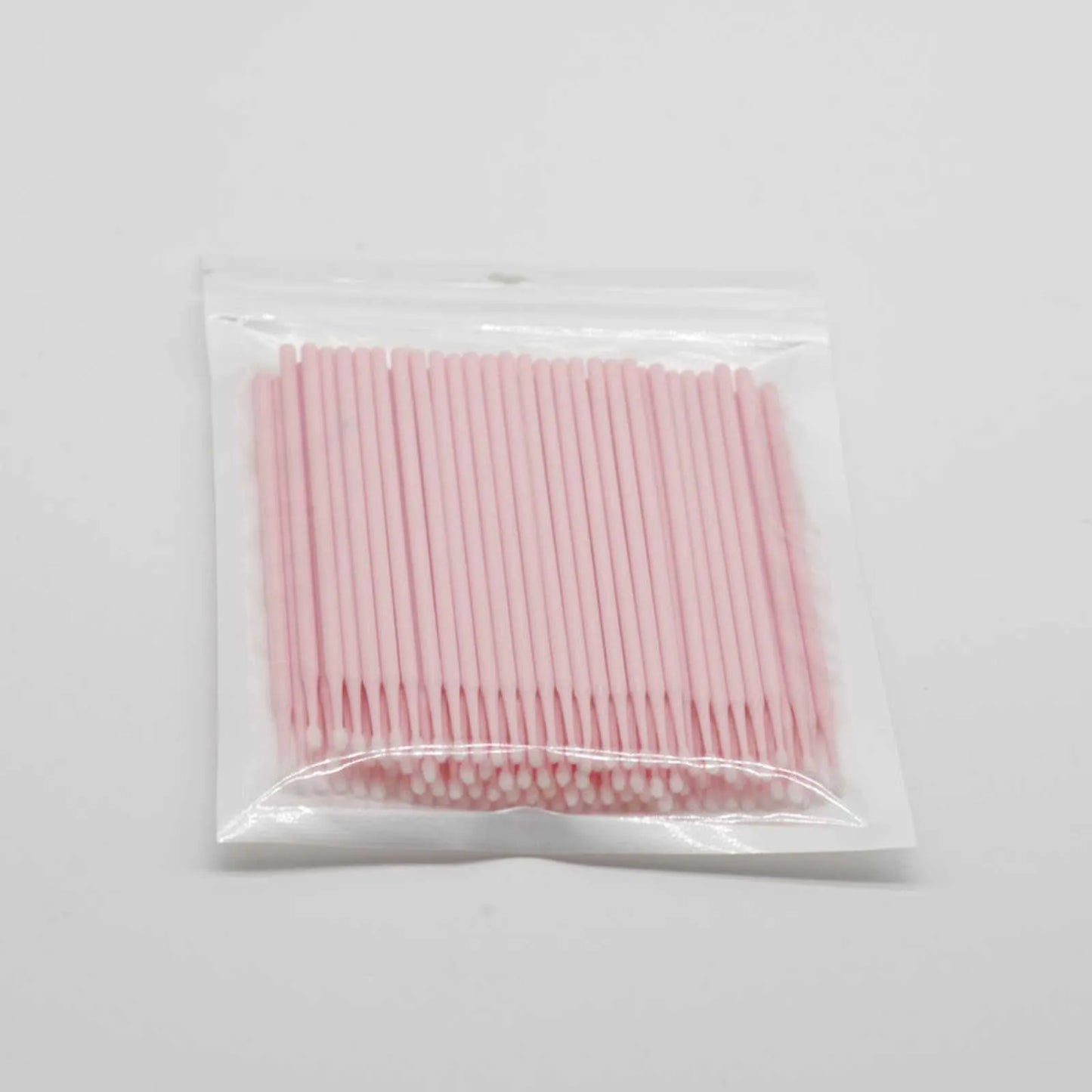 Disposable micro applicator brushes with coloured plastic handles and bendable cotton swab tips