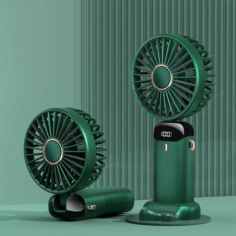 Blue foldable mini handheld electric fan showing its LED display and hanging lanyard.
