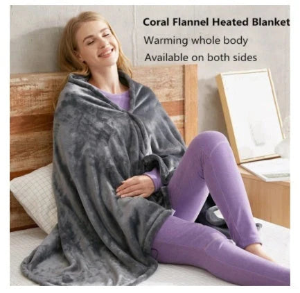Cozy and heated plush blanket with adjustable temperature settings and soft, plush fabric for maximum winter comfort