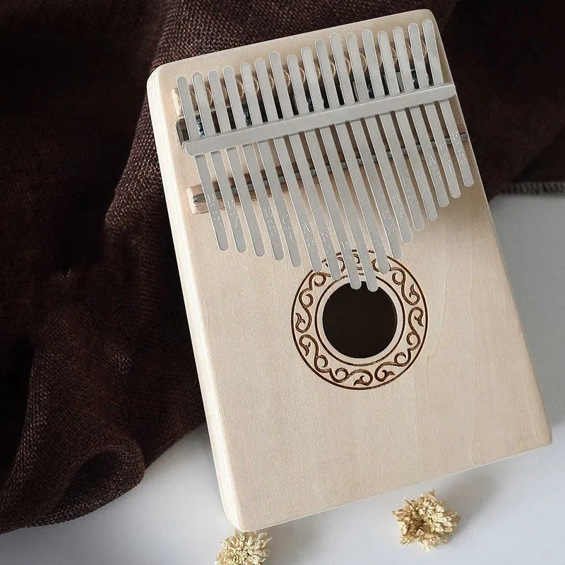 Basswood beginner thumb piano kalimba with no-lacquer finish, available in seven styles including Clouds and Gothic.