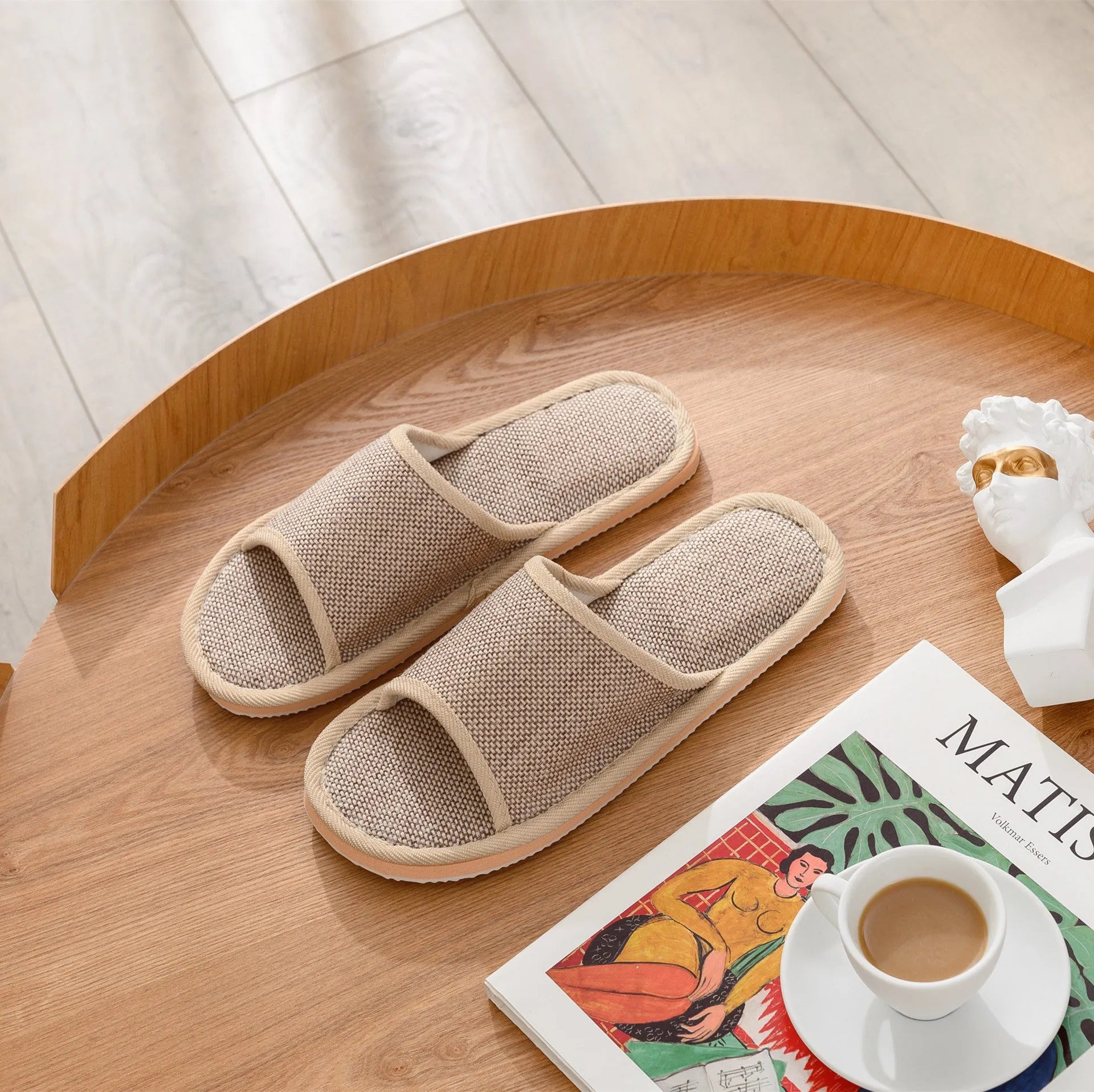 Women's open-toe linen slippers with thick sole in light brown colour.