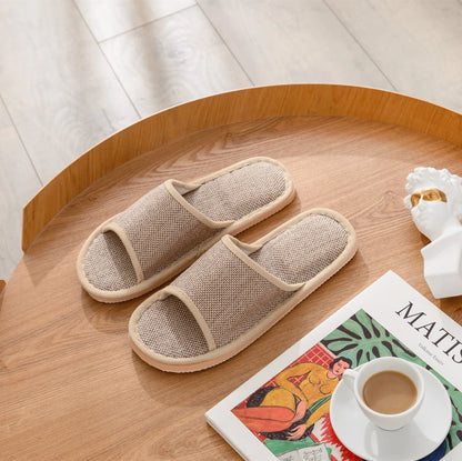 Women's open-toe linen slippers with thick sole in light brown colour.