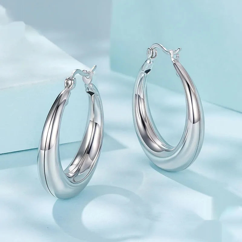 Copper geometric ring ear clip earrings in three sizes with electroplated finish