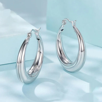 Copper geometric ring ear clip earrings in three sizes with electroplated finish