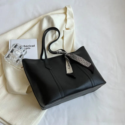 Women's large capacity casual tote crossbody shoulder bag in khaki colour with outer pocket and zip compartment.