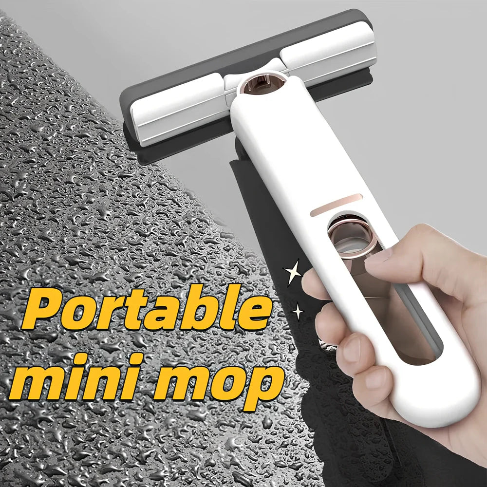 Portable self-squeezing mini mop with biodegradable cotton head and 180-degree folding mechanism