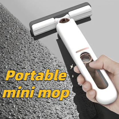 Portable self-squeezing mini mop with biodegradable cotton head and 180-degree folding mechanism