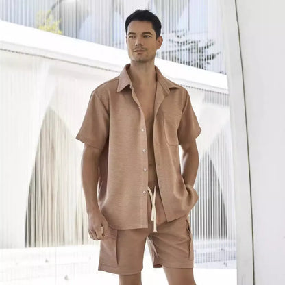 Women's elastic waist shorts set in beige, showing short-sleeve top and matching shorts.