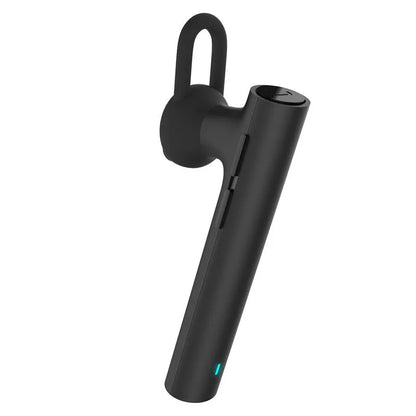Black wireless Bluetooth headset showing compact 5.6cm design with charging cable