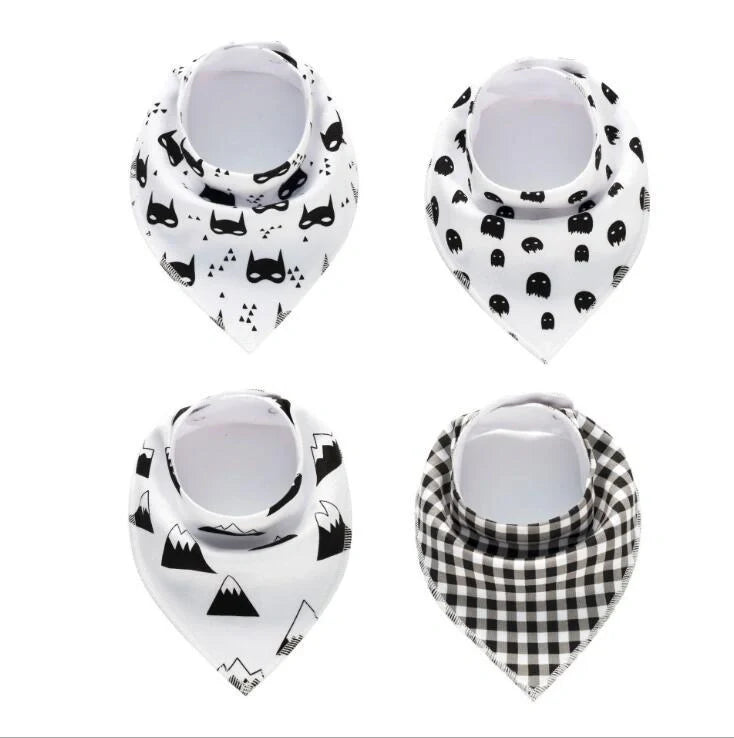 Set of four cotton baby bibs with arrow and wave designs for mess-free feeding