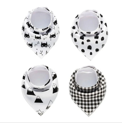 Set of four cotton baby bibs with arrow and wave designs for mess-free feeding
