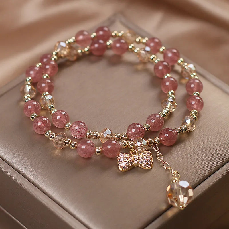 Red Cat's Eye Flower colour double-layer strawberry quartz crystal bracelet with lucky cat charm.