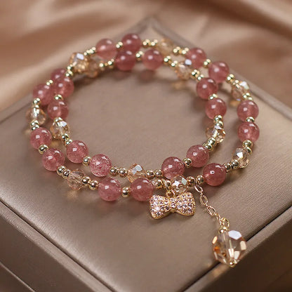 Red Cat's Eye Flower colour double-layer strawberry quartz crystal bracelet with lucky cat charm.
