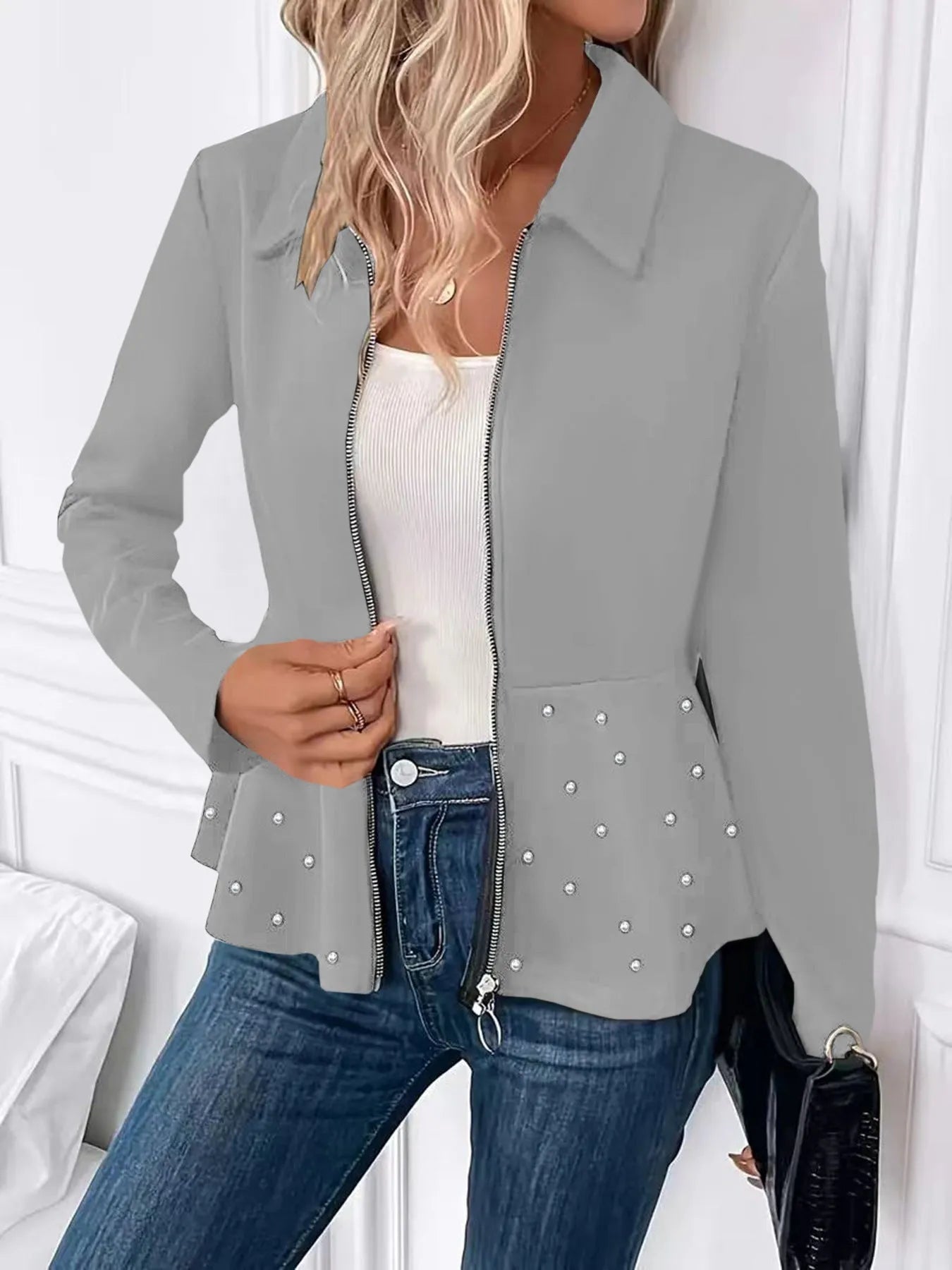 Women's black coat with beaded heavy-duty zipper and ruffled hem detail