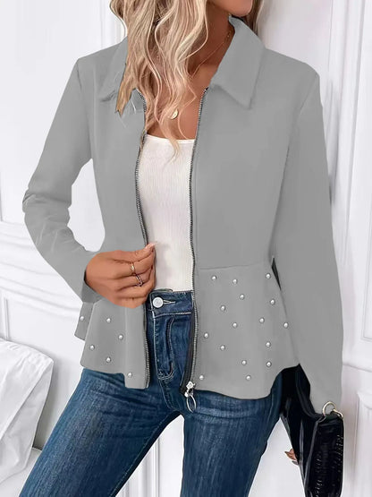 Women's black coat with beaded heavy-duty zipper and ruffled hem detail