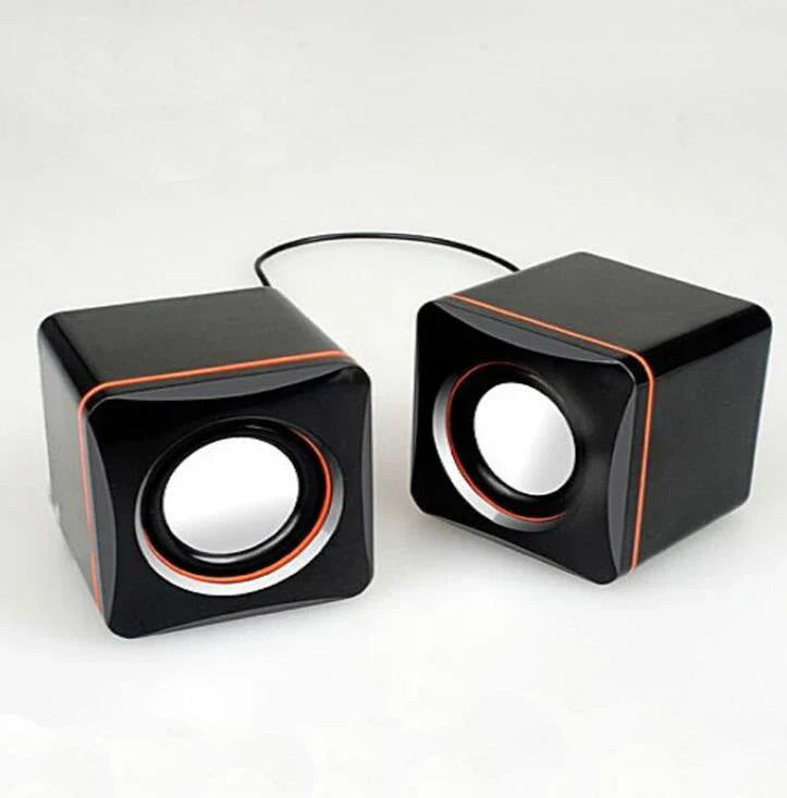 Compact and portable USB-powered desktop speaker with sleek design and high-quality audio performance