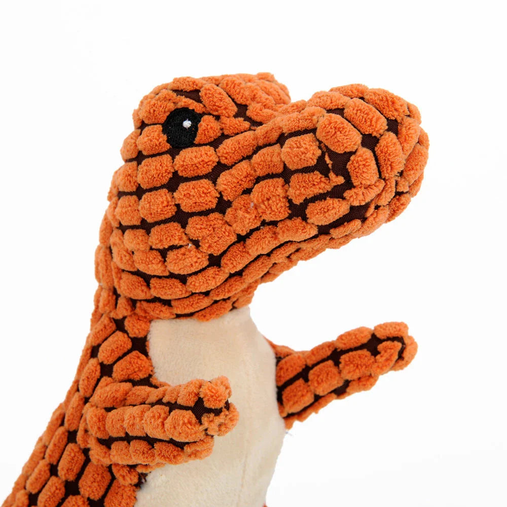Durable dinosaur-shaped dog toys made of corn velvet and plush filling, available in multiple colors and sizes for large and small pets