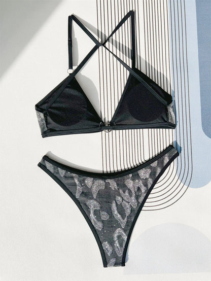 Black two-piece ladies bikini swimsuit with adjustable straps, shown on a model.