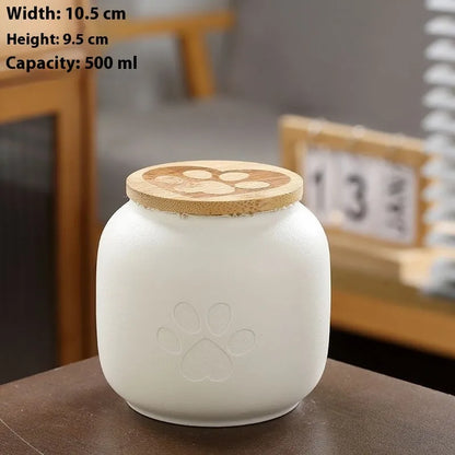 Ceramic pet funeral urn with foot print design in choice of colours and 180ml or 500ml sizes