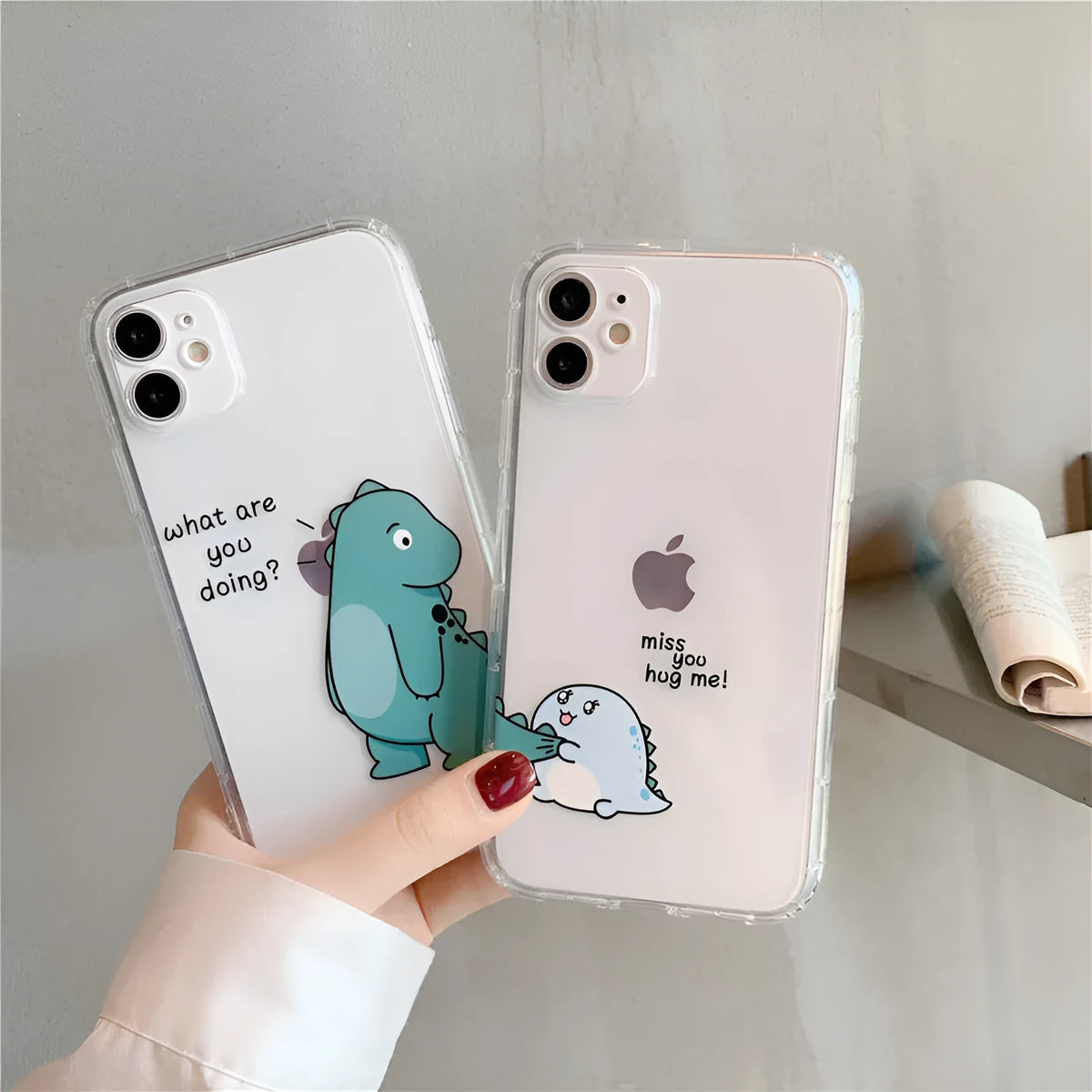 Transparent silicone and TPU iPhone case with airbag protection featuring a cute green dinosaur design.