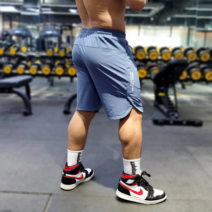 Men's quick-dry running shorts in polyamide-spandex blend fabric shown in black, blue and grey colour options