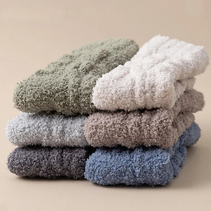 Plush coral fleece socks in various colors, designed for cozy and comfortable home wear