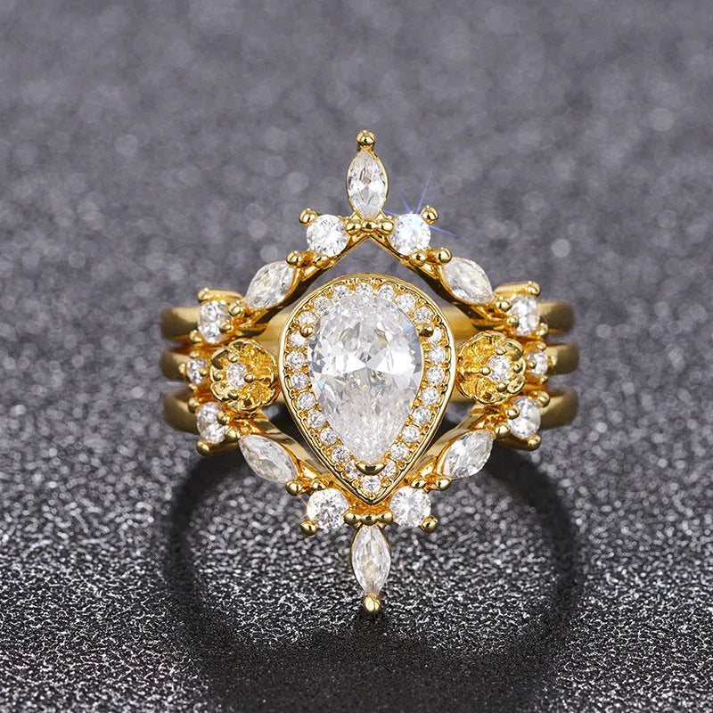Women's Copper Ring with Inlaid Zircon Drop-Shaped Design in Yellow Gold Colour, Sizes No 6 to No 10, Geometric Water Droplet Style for Everyday and Occasion Wear