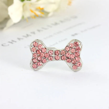 Rhinestone decorated dog bone shaped hair clip in alloy metal