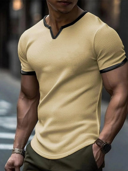 V-neck colour-block waffle texture outdoor sports T-shirt in polyester fabric on a neutral background.