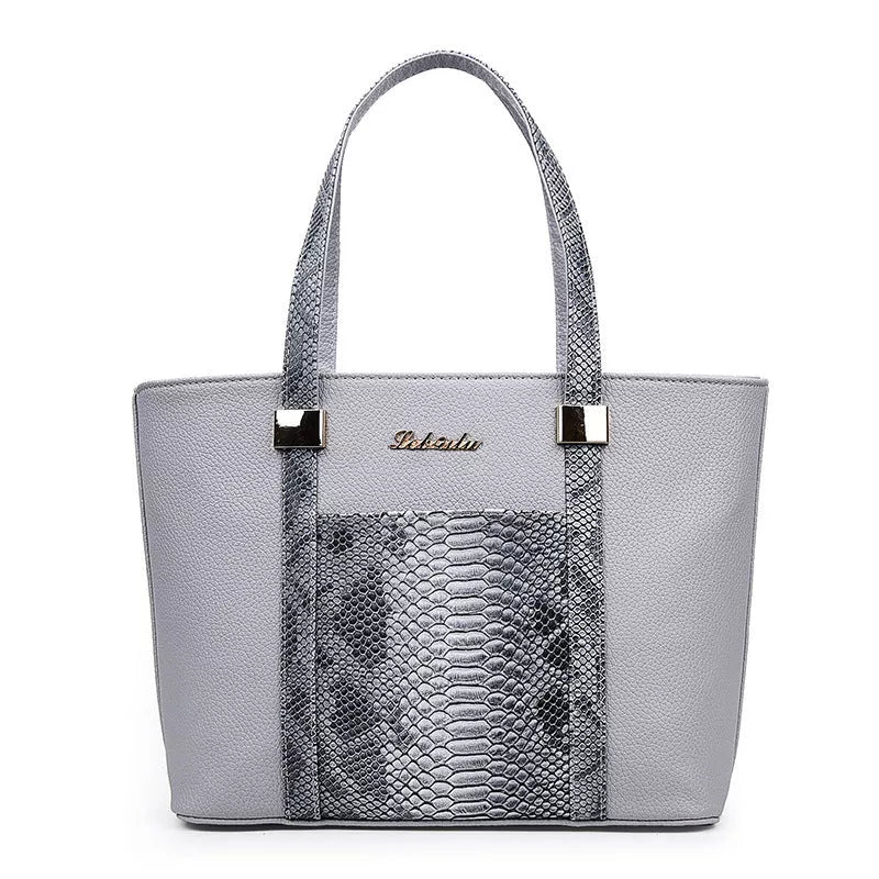 Women's shoulder bag with zipper closure and multiple pockets in light grey, black, off-white, and rose red