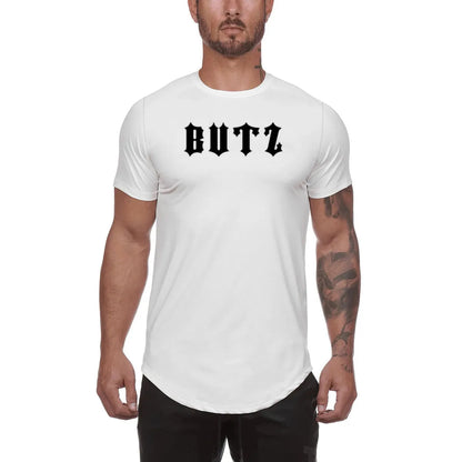 Men's plain grey gym shirt, blouse style, on a hanger showing relaxed fit and cotton-spandex fabric.