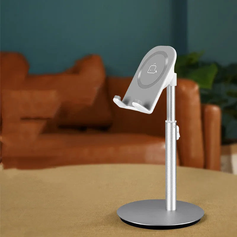 Silver metal desktop stand holding tablet and phone for hands-free viewing