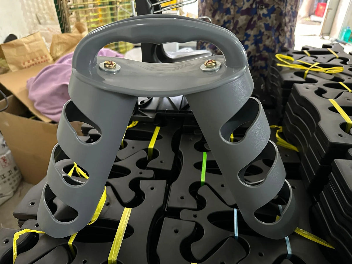 PVC fitness dumbbell rack with removable bracket support on a gym floor