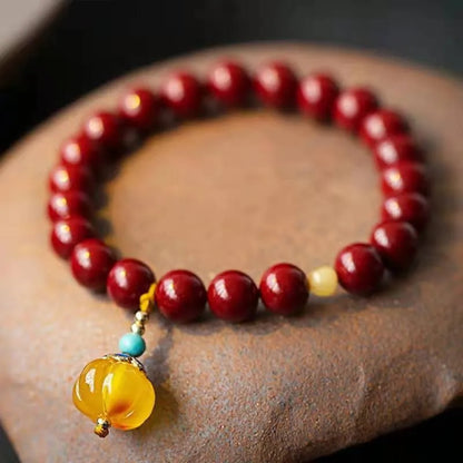 Handmade gold cinnabar wave bracelet with copper beads in national style design