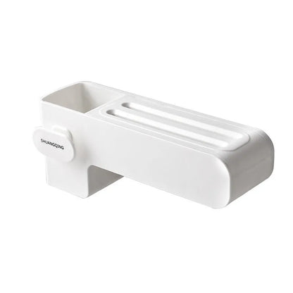 White modern plastic knife block holding six kitchen knives on a countertop.