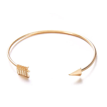 Gold-coloured vintage arrow knotted cuff bracelet for women.