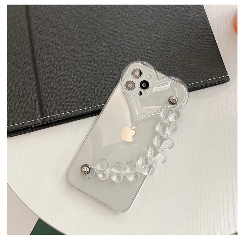 Transparent TPU iPhone case with love bracelet heart chain design on a mobile phone.