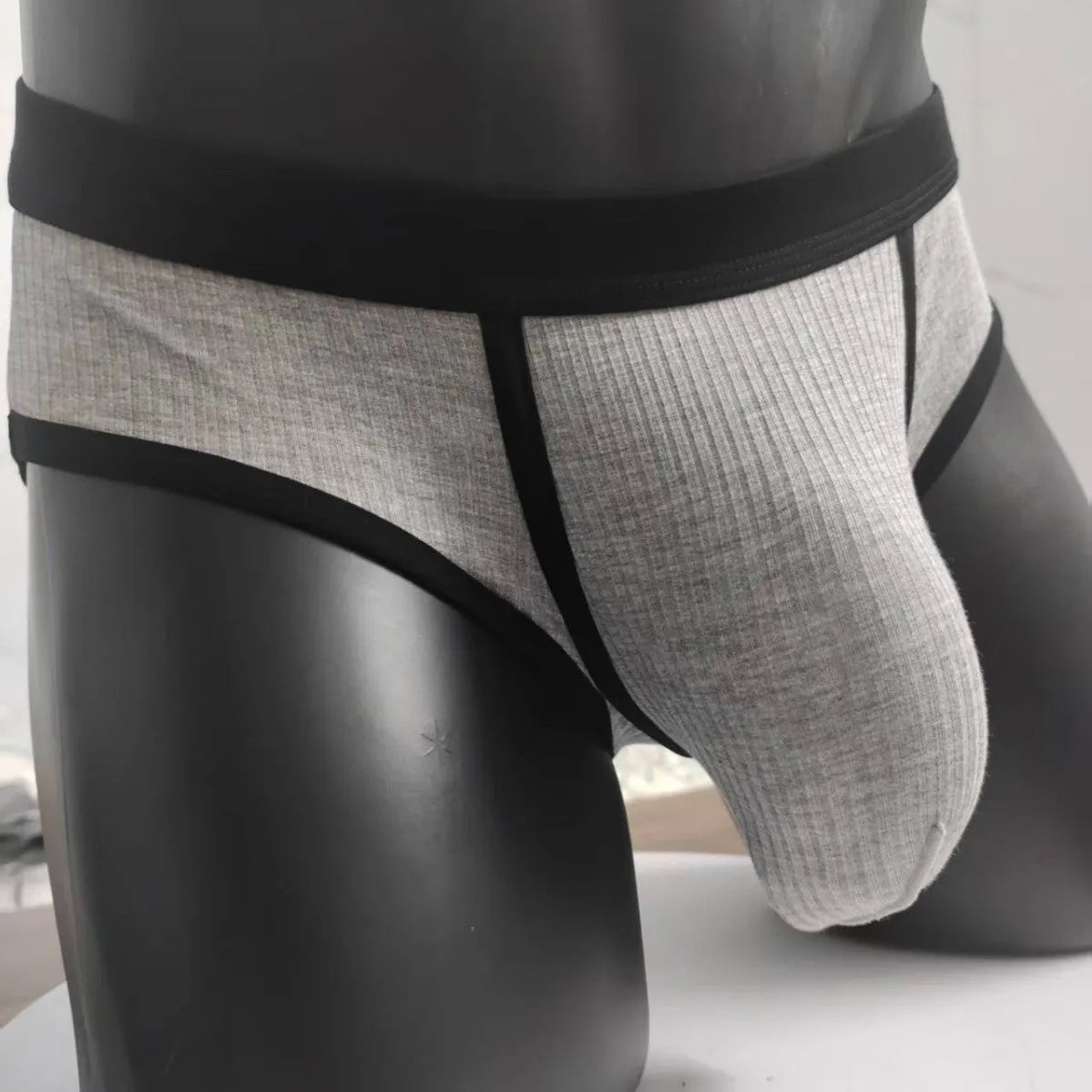 Men's triangle U-shaped bag underwear in viscose fabric showing solid colour options